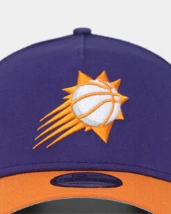 New Era Phoenix Suns "Purple Valley" 9FORTY A-Frame Snapback Purple/Orange 7 New Era Phoenix Suns "Purple Valley" 9FORTY A-Frame Snapback Purple/Orange -Mitchell & Ness Shop 01023630 YP227 default 0050