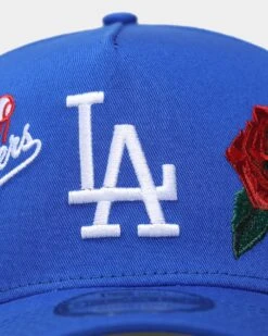 New Era Los Angeles Dodgers Rose Emblem 9Forty A-Frame Snapback Blue 7 New Era Los Angeles Dodgers Rose Emblem 9Forty A-Frame Snapback Blue -Mitchell & Ness Shop 196313253414 default 0050