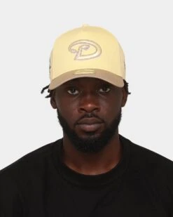 New Era Arizona Diamondbacks 'Butter Popcorn' 9FORTY A-Frame Snapback Yellow -Mitchell & Ness Shop 196821258147 mens 0100