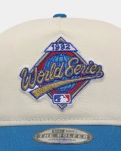 New Era Toronto Blue Jays '1990s World Series Through The Decades' 1992 World Series Golfer Snapback Chrome White -Mitchell & Ness Shop 197214869704 default 0050
