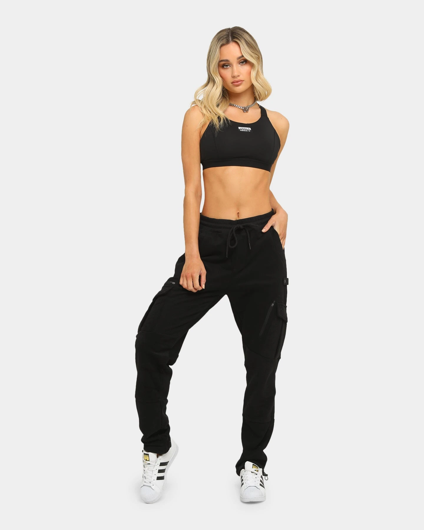 Carré Evolution Cargo Track Pant Black Carré Evolution Cargo Track Pant Black -Mitchell & Ness Shop 4454569222377 womens 00030