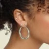 Raising Hell Women's 2mm Iced Huggie Earring Iced White Gold -Mitchell & Ness Shop 4454569768356 default 0001