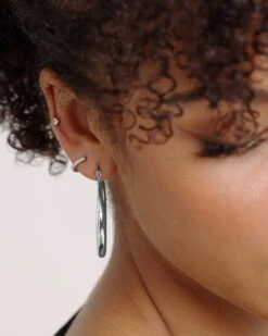 Raising Hell Women's 2mm Iced Huggie Earring Iced White Gold -Mitchell & Ness Shop 4454569768356 default 00020